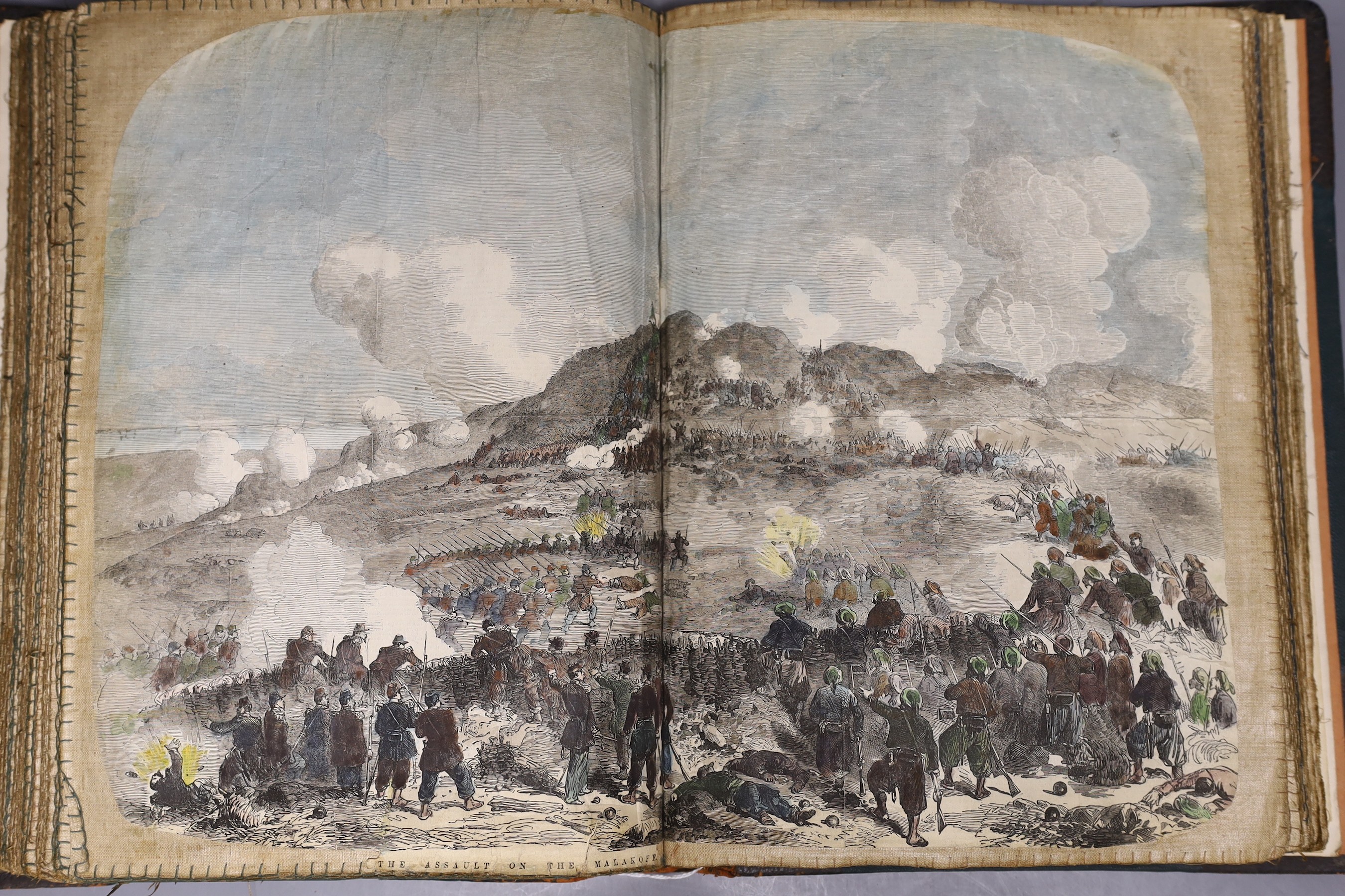 A Victorian scrap book with canvas pages